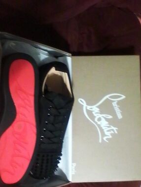 Christian Louboutin Black Lace-Up Sneakers with Red Sole